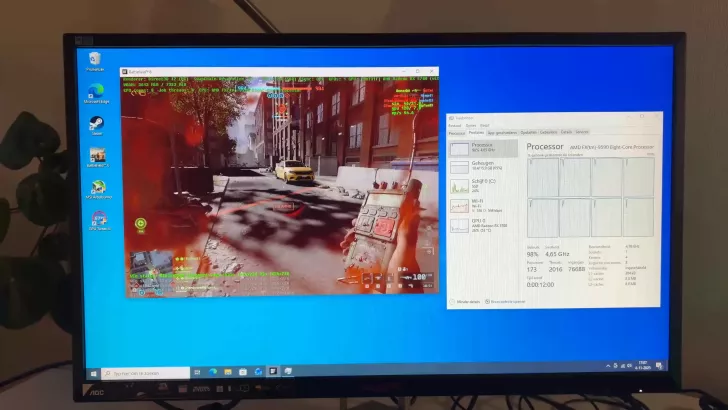 AOC monitor showing Battlefield 4 gameplay and performance stats with AMD Radeon RX 5700 on an AMD FX-9590 processor.