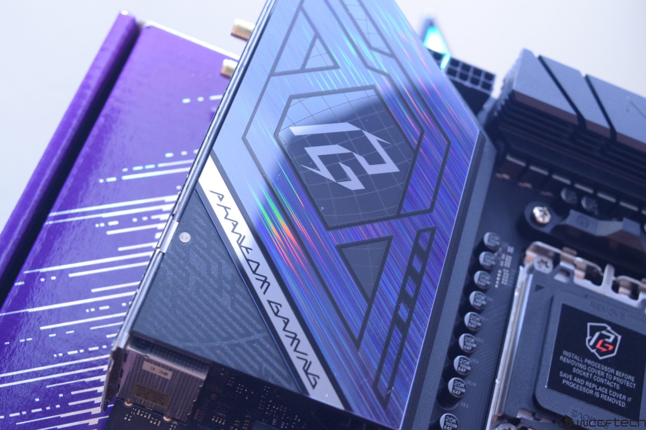 Close-up of a Phantom Gaming graphics card on a motherboard, showcasing its sleek design.
