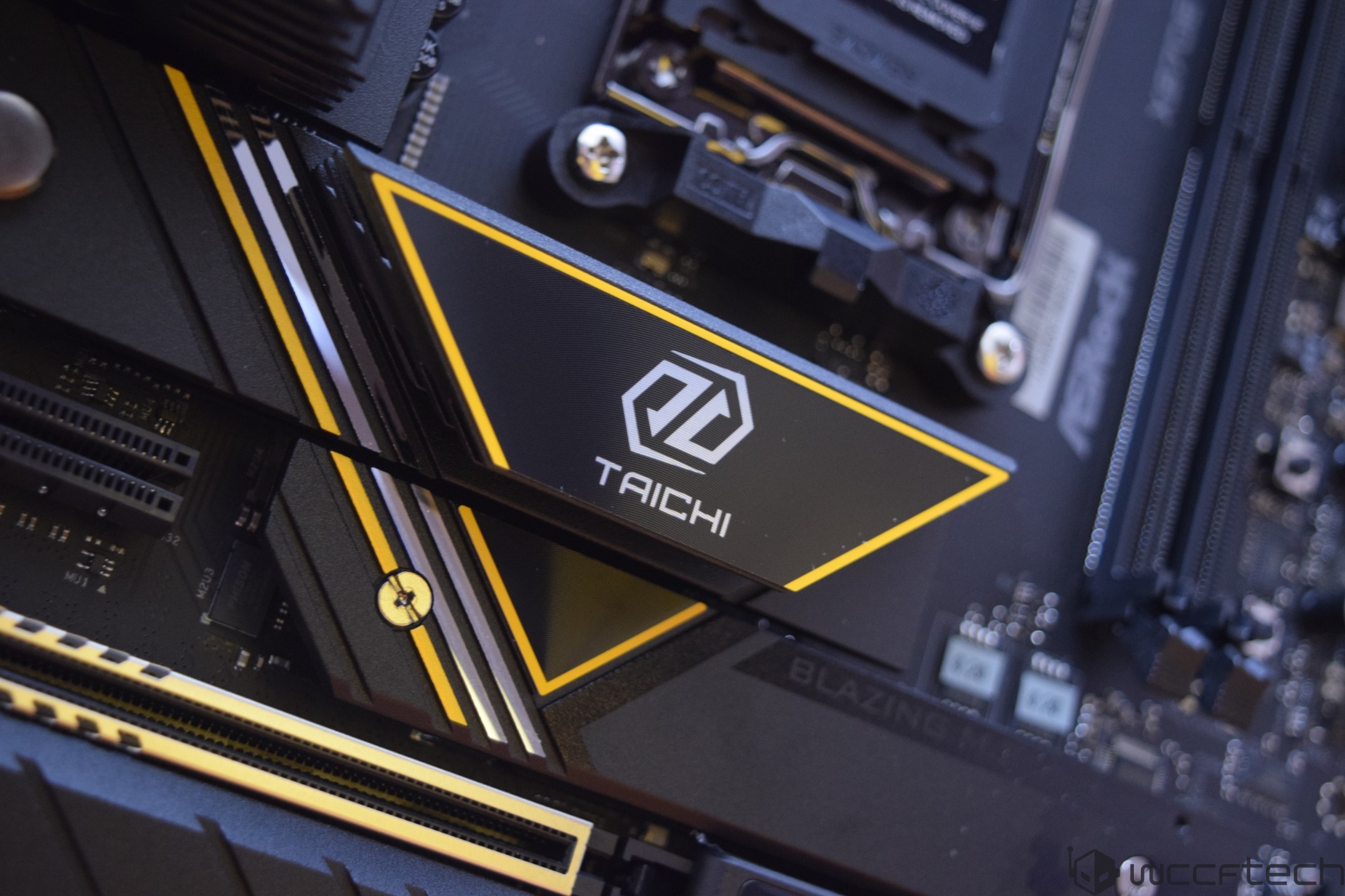 ASRock Taichi motherboard with BLAZING text visible.