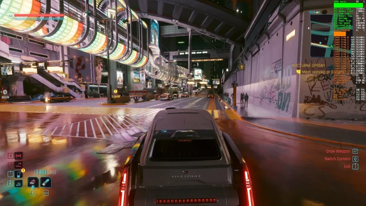 A scene from the game Cyberpunk 2077 shows a car driving through a futuristic cityscape with detailed on-screen tech stats including 'Aorus 5090' at the top right.