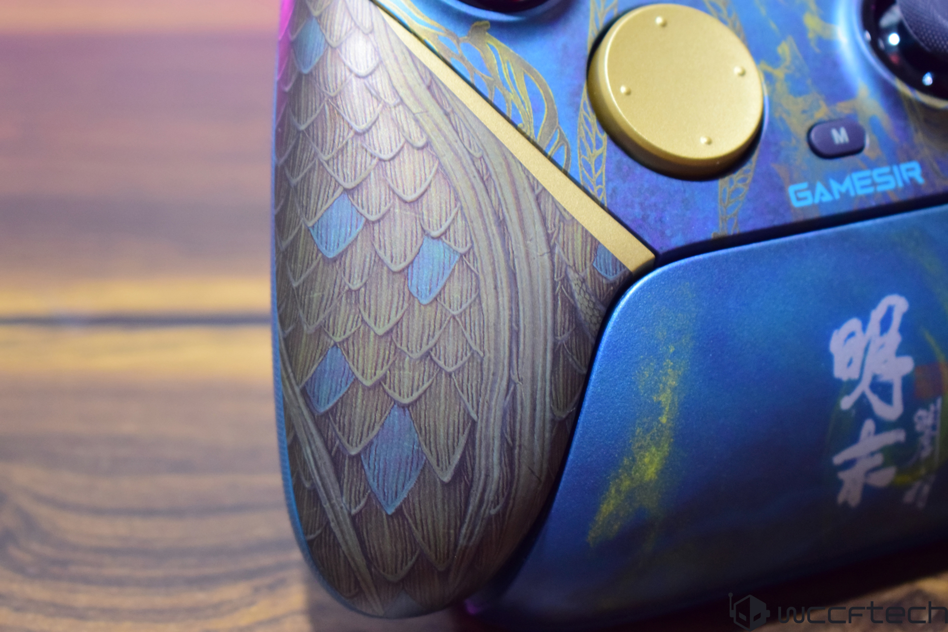 GameSir controller with decorative design on table, text reads GAMESIR.