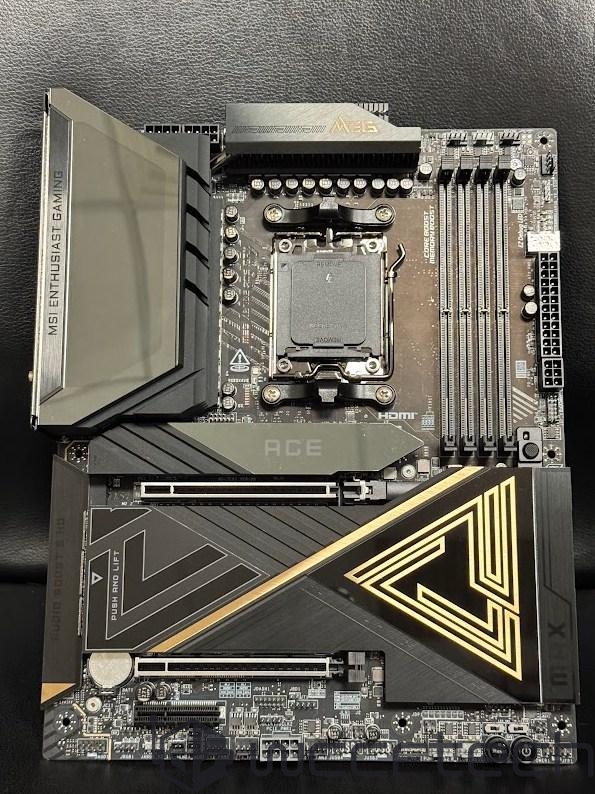 MSI Enthusiast Gaming motherboard with ACE and PUSH AND LIFT text on a black surface.